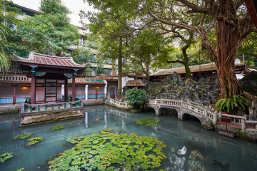 Fototapeta na wymiar Beautiful chinese garden with a pond