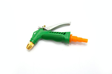 green squeezing sprayer is placed on a white background for agricultural spraying.