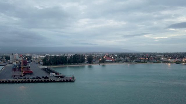 Cityscape from cruise ship in Maui, Hawaii. Kahului Harbor is located on Maui's north central coast. Kahului Harbor is primarily a commercial harbor and port.