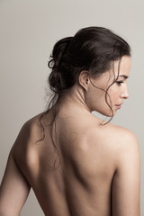 natural beauty concept young woman with wet hair in bun profile and back studio shot