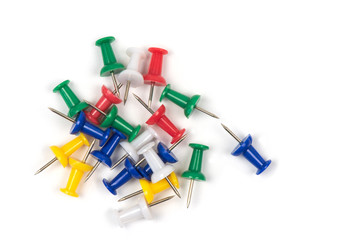 colorful pins on white background