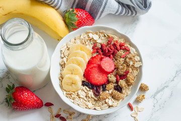 Breakfast oatmeal porridge with milk and fruits healthy food lifestyle 
