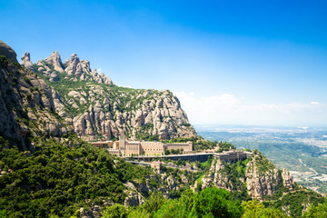 Obraz premium Panoramic views of the mountains and Montserrat Monastery, Catalonia, Barcelona, Spain. Beautiful landscape