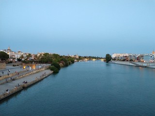 Fototapeta na wymiar walk along the river at dusk