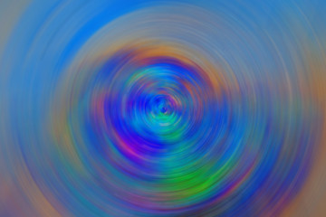 Bright futuristic multicolored background with radial blur. For use in lettering or design.