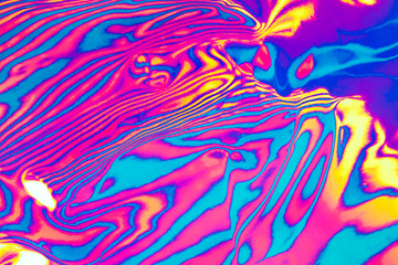 neon colored psychedelic fluorescent striped zebra textured background