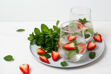 drink with red strawberry mint and ice
