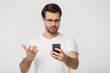 Millennial mad man annoyed by slow internet.