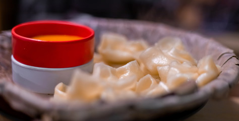 extreme close-up of momo dumplings.