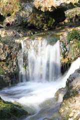 Naklejka na ściany i meble Waterfall in Majolan park Blanquefort city in Bordeaux Gironde