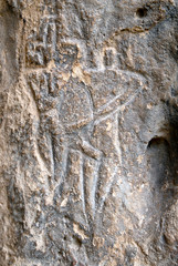 Naked man and woman. Prehistoric Petroglyphs (rock painting) are included in UNESCO World Heritage List. Gobustan National Park, Azerbaijan, Caucasus.