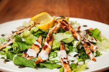 Grilled Chicken Breast fillet with fresh tomatoes vegetables salad. concept healthy food.