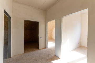 Russia, Moscow- September 10, 2019: interior room rough repair for self-finishing. interior decoration, bare walls of the room, stage of construction