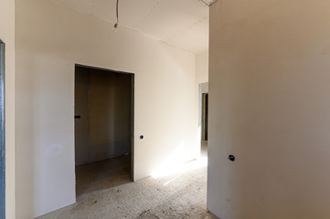 Russia, Moscow- September 10, 2019: interior room rough repair for self-finishing. interior decoration, bare walls of the room, stage of construction
