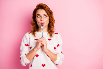 Close-up portrait of her she nice attractive pretty dreamy cheerful wavy-haired girl licking fork...