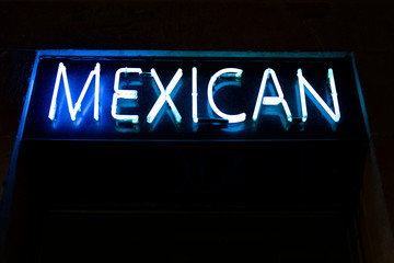 Neon panel with the word Mexican written in blue.