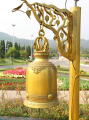 Gold bell outside the temple in Thailand