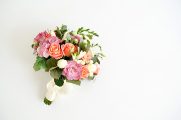 Wedding flowers. bouquet of roses in a bucket on a white background with a copy space
