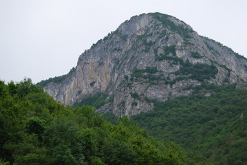 Fototapeta na wymiar Vrachanska Skaklya Waterfall - the highest in Bulgaria - 141 meters, and around him.