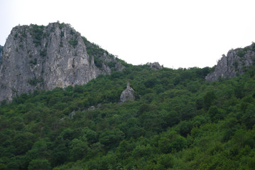 Fototapeta na wymiar Vrachanska Skaklya Waterfall - the highest in Bulgaria - 141 meters, and around him.