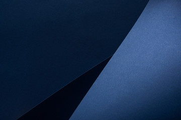 top view of curved blue paper background