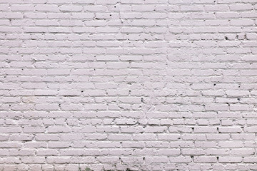 Painted brick wall in a light shade.Textured wall background.