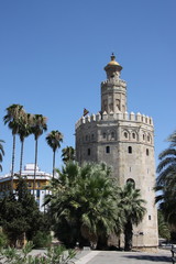 Fototapeta na wymiar Seville landmark Golden tower of Torre del Oro on the Guadalquivir seafront, Moorish tower, built to protect the harbor of Seville in 1220