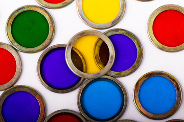 Fototapeta premium Colorful filter rings on isolated white background 