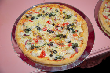 Simple pizza with mozzarella , olives and cherry tomatoes . Pizza with spinach, feta, olives and cherry tomatoes. pizza with peperoni and black olive rings, clipping path .