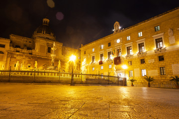 Fototapeta na wymiar Night view of Piazza Pretoria commonly called Square of Shame, Palermo