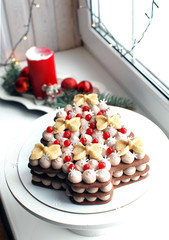 Christmas tree chocolate cake on the window