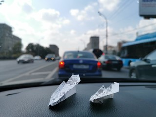 The paper aircrafts in the car