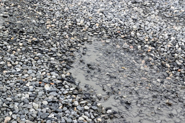 Ground with stones