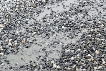 Ground with stones