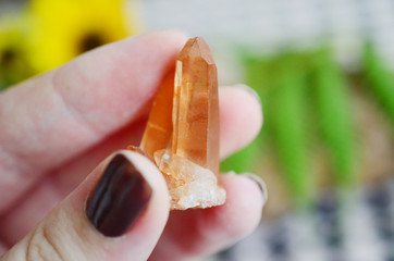 Tangerine Quartz in womans hand! Premium quality crystal Quartz healing stone, extremely unique crystal formation! Red Quartz Specimen, orange quartz stone. Rough crystal point, natural lighting