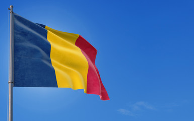 Chad flag waving in the wind against deep blue sky. National theme, international concept. Copy space for text.