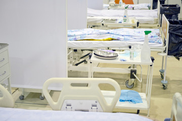 Hospital couches ready to receive patients in a row.