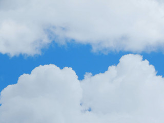 light blue sky with clouds, horizontal photo