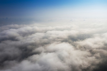Big Blue sky and Cloud Top view from airplane window,Nature background