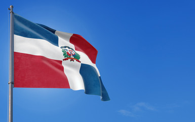 Dominican Republic flag waving in the wind against deep blue sky. National theme, international concept. Copy space for text.