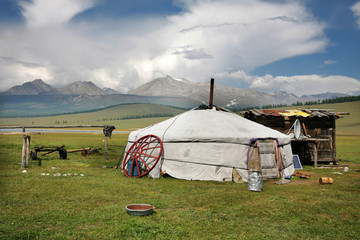 Landscapes of Mongolia, yurts against the backdrop of Mount Munch-Sardyk. Traveling in Asia.