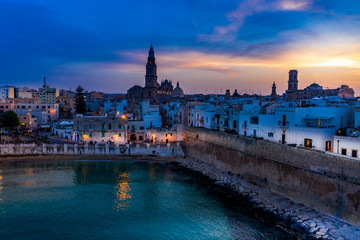 Fototapeta premium Aerial view, from the old town of Monopoli, at dusk, Puglia, Italy,
