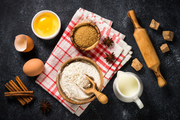 Ingredients for cooking baking on black.