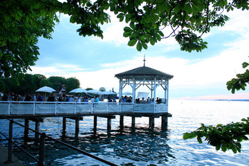 Bregenz / Austria - June 06 2019: Restaurant on Harbor Bridge on the lake in Bregenz, Austria.