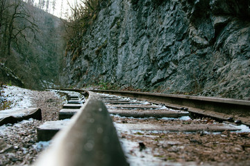 Old railway in the mountains. Winter.