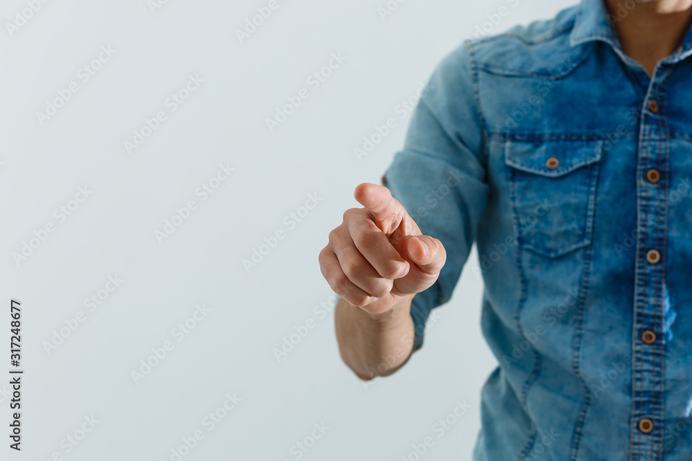 Poster hand presses the index finger on the touchscreen. button on the touchscreen