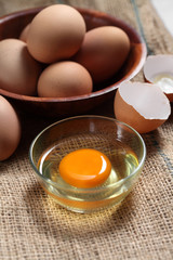 Group of of raw chicken eggs on rustic background, Ingredient for Scrambled eggs in loft style kitchen