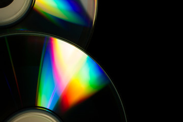 compact-discs on a black background