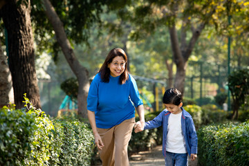 Cheerful grandmother spending leisure time with grandson