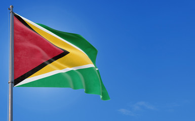 Guyana flag waving in the wind against deep blue sky. National theme, international concept. Copy space for text.